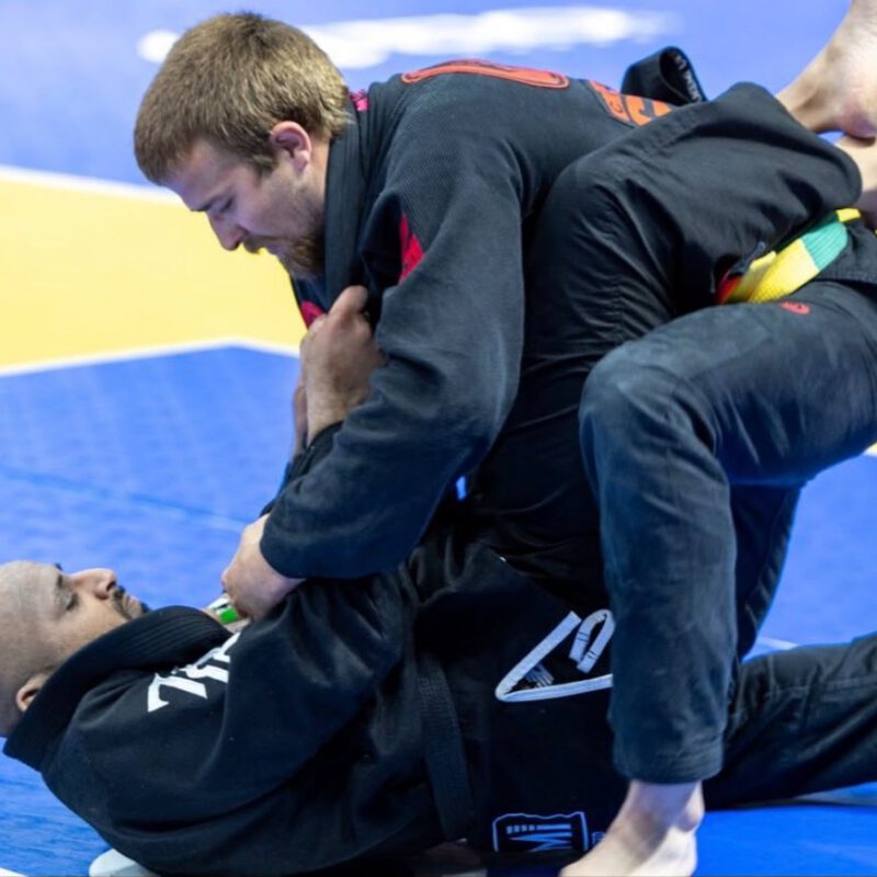 Professor Cody MacCharles competing in a Brazilian Jiu-Jitsu gi match at the Ontario Open.