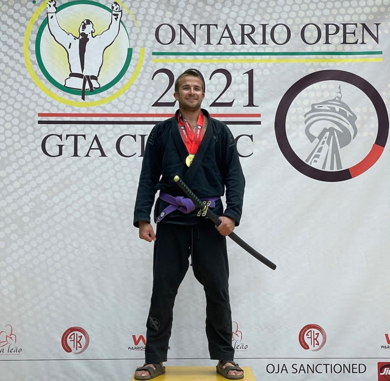 Cody MacCharles wearing his medal after winning the absolute division at the 2021 Ontario Open.