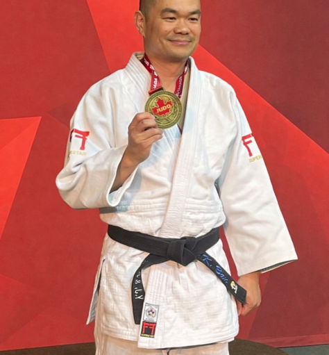 Sensei Kevin – Canadian National Judo Ne-Waza Champion Sensei Kevin holding his gold medal after winning a Canadian national Judo ne-waza title.